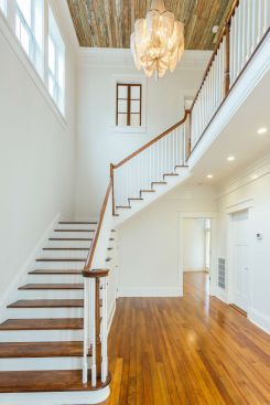 The goal of this project in the Uptown neighborhood of New Orleans was to restore it to its original glory while adding modern amenities to appeal to homebuyers. Williamson achieved this by reusing much of the existing materials and infusing them into the design. In addition to saving the wood flooring plank by plank, the staircase also was refurbished.