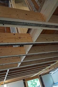 Framing as a system: The completed framing repairs result in a flat, level floor/ceiling assembly with all loads transferred effectively to the foundation. 
