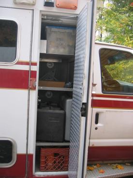 The forward compartment contains several adjustable shelves. This shot is from close enough for you to see the quality of construction: the thick door add heavy latch, the stop at the top of the door, and the weatherstripping on both door and jamb. The module is aluminum with stainless steel hardware so it won't rot out the way many service bodies will.
