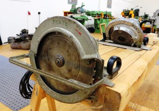 You see more big saws in Europe than here because they use larger framing members and have to remodel old timber framed homes. And timber framing remained popular there long after it fell out of favor here. The invention of stick framing (at that time balloon framing) in 1830s Chicago was the beginning of the end for timber framing in the U.S. When you stick frame like we do, you don’t need big saws, except to cut the occasional beam. Note the dado saw in the background—more on it in the next slide.
