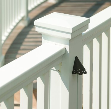 The author sanded the sleeves, caps, and bases and gave them a coat of 100% acrylic latex paint, then assembled all of the components on the jobsite.