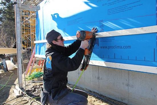 EcoCor carpenter George Reefer applies strapping outboard of the newly installed ProClima Solitex Plus membrane. Siding will be installed over the strapping to complete the weather exterior. Windows, currently on order, will be installed later in the spring. But with the outer membrane and strapping complete, the wall can now be insulated.