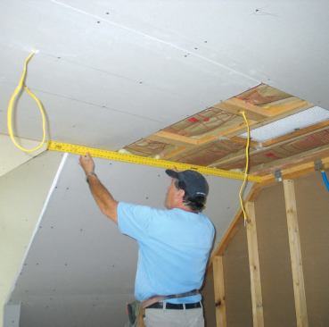 Rigid rulers are good for taking ceiling measurements because they don't collapse.