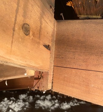 Inside the attic, the problem was immediately apparent: One ridge board had dropped approximately 1 3/4Â inches.