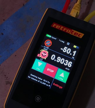 The Retrotec uses an added input for house volume to read out in ACH.