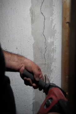 Toby continues up the crack, drilling the holes at approximately 10 inch intervals