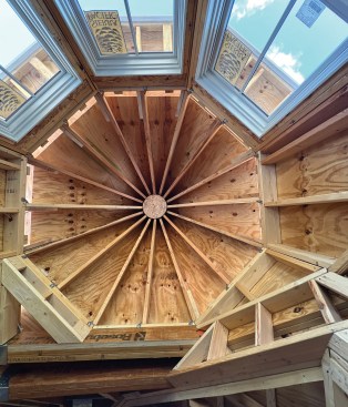 The stick framed turret roof shows the skill needed to recreate this new Victorian. 