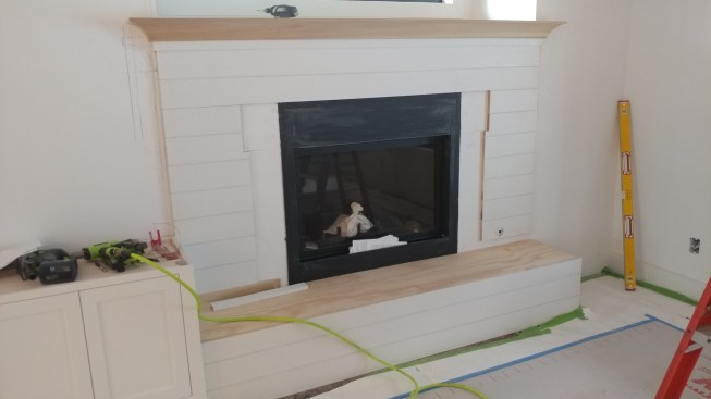 Whether you are working on a fireplace or full wall, slivers must be addressed before installation. I use the Construction Master Pro app on my phone to figure out where the skinny piece will be and how big it is, and that determines how I address it.