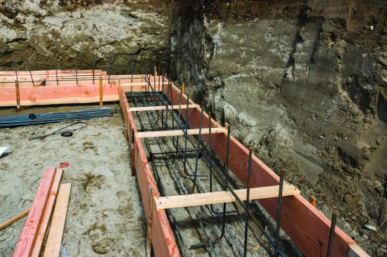 The string line also allowed exact positioning of the steel “verts” that were tied into the footings.
