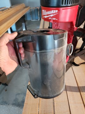 The cannister removed easily with a simple button and empties quickly.