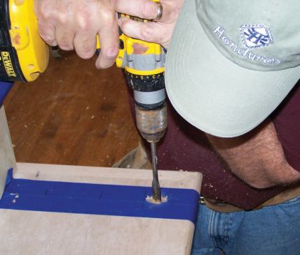 I use a spade bit to drill larger holes for the baluster itself, sizing the hole so that it is about 1/4 inch larger in diameter than the baluster’s base and penetrates the stringer by about 3/4 inch.