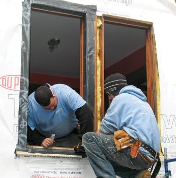 The replacement windows were sized to fit the original double-hung window jambs, which were retained and flashed with a peel-and-stick membrane.