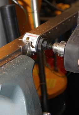 To make it harder on the saw he makes an interrupted cut where the teeth are part way in and out of the stock. This cut is being made with a Lenox Speed Slot hole saw – which except for some wear to the paint looked to be as good as new after a couple of cuts.