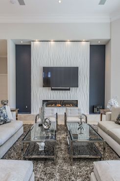 41 West founder and co-owner BJ Barone envisioned a seamless wave panel surrounded by mosaic glass tile as a backdrop for the sleek electric fireplace—but doing so would take a little ingenuity. Listen as he explains how he came up with the perfect solution to the design dilemma. 