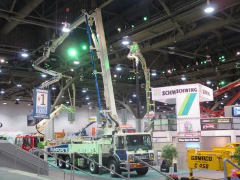 I’ve been to the World of Concrete several times and yet I’m always amazed by the way they manage to bring pump trucks into the convention hall and extend their booms around posts and other obstructions.