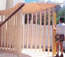 Figure 8. Once all the studs are fastened, brace the frame plumb.