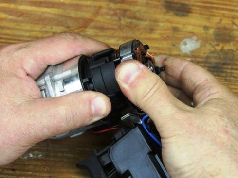 Pull stator off of rotor (it’s tough because a powerful magnet in the rotor is holding it on).