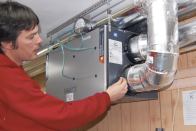 A heat-recovery ventilator (HRV) pulls in fresh outdoor air while exhausting stale air from indoors.