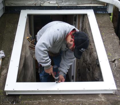 Attaching the Cap: Prepositioning the screws in their holes makes the installation go fast. When screwing through PVC this way, I always predrill tapered countersunk holes, then glue in plugs that I cut on site from scrap PVC. The plug-cutter and countersinks I use are made by Fuller (wlfuller.com). I trim the tops of the plugs off with my Tajima 18-point flush-cutting saw, sand the surface, and end up with a perfectly concealed screw.