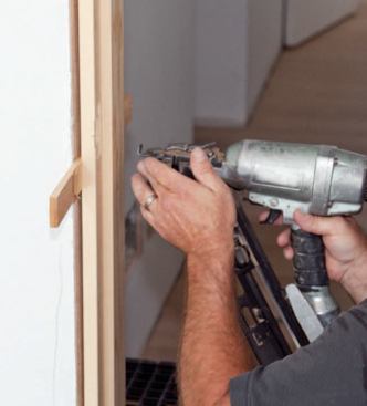 A shim behind the latch location provides stiffness for drilling and mortising the strike plate.