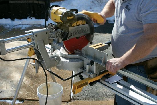 Upper and lower tracks, F-channels for the sides, and H-channels used to join storm-door panels together and to the framing are supplied long. We cut them to length using a chop saw; a standard trim blade works well.