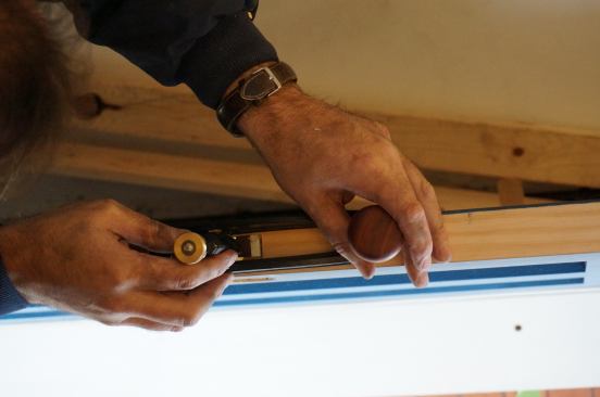 To minimize the dust and debris on site, Greg finishes cleaning out the latch mortises with a butt mortise plane.