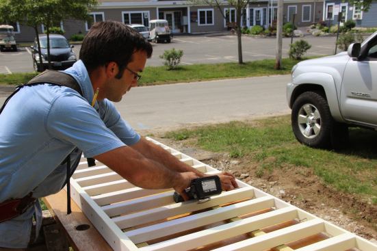 Pollard pre-sets stainless steel #7 1.5-inch screws into the sub-top-rail in preparation for attaching the baluster and rail assembly to the already placed top rail.