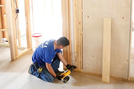 My plumber is making quick work of this upgrade. DeWalt’s cordless sawzall is a handy tool!