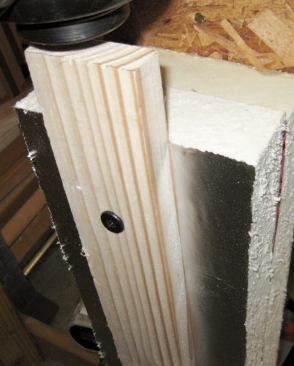 This sample is in position to be tested, with the head of the screw just proud of the strapping surface.