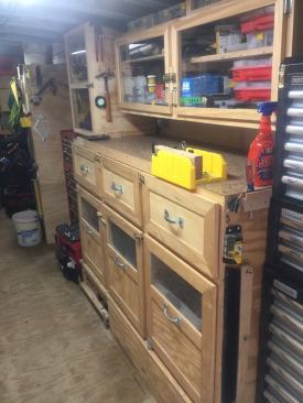 This was shot from several feet in from the ramp and shows a cabinet, countertop, and two large mechanics tool chests.