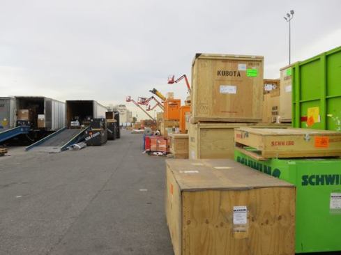 Most of the tools and displays at the World of Concrete arrive in crates and trailers--which are stored in outdoor lots during the show. There are more of them than you can imagine and they cover acres and acres of ground. These are just a small portion of the crates and trailers stored in one area of the convention center grounds. The only way to see more crates than there are at WOC is to watch the end of Citizen Kane or Raiders of the Lost Ark.