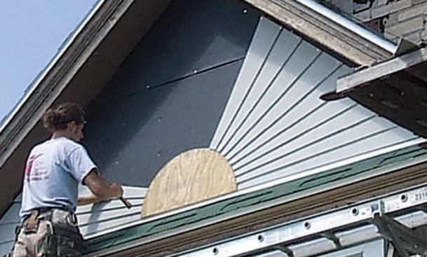 I worked up both sides to the top piece, which I caulked along both edges before installing.