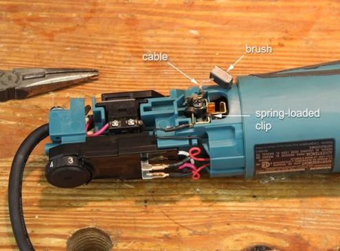 Pull brush out so it won’t be damaged when you remove the armature.