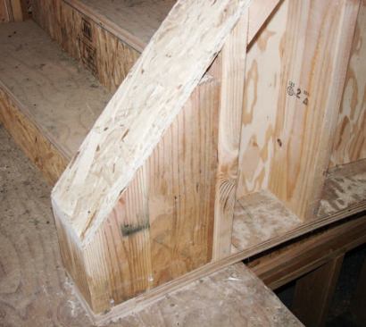 I blocked between these studs, using both glue and nails, and added solid blocking at top and bottom to provide anchor points for the metal railing.