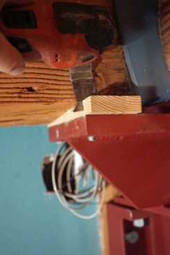 Before the end brackets could be installed, the gusseted brackets on the steel beam had to be shimmed.