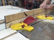 He runs one side of the ripped OSB through the saw ...