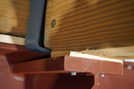 Since the purlins were at varying elevations and angles relative to the steel beam, these shims were cut at compound angles. 