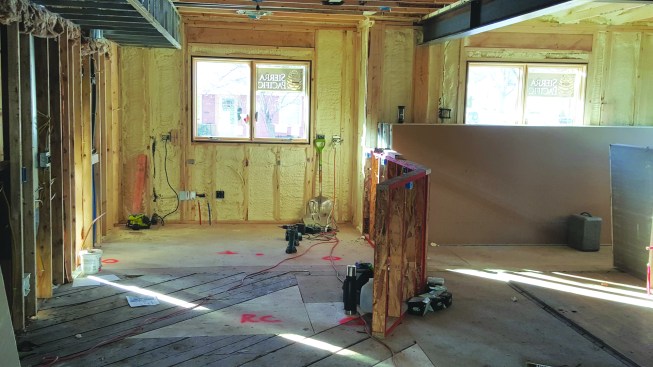 The author achieved this balance using Zip System R-12 sheathing with 2 inches of spray polyurethane foam in wall cavities. Adding the rest of the assembly components yields a total effective wall value of around R-28.