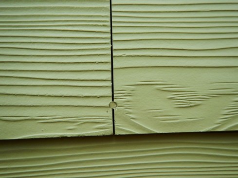 A single nail placed in a butt joint is not enough to secure the siding.