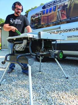 The optional folding stand bolts to the saw and has locking legs.