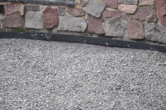 Steel edging was already in place along one stone wall.