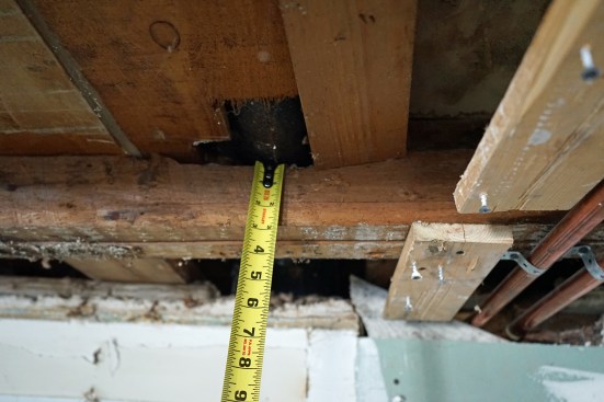 Very little was left of some joists after the plumber's work.