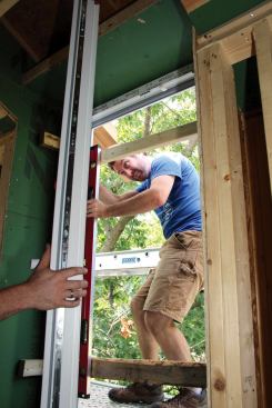... and makes a final check for plumb.