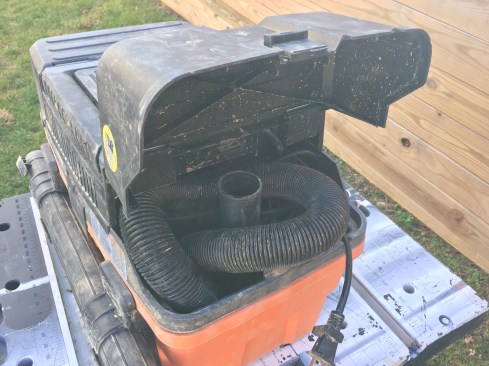 Hose, cord, and crevice tool storage. It’s a little fight to get them back in the compartment, but not bad. The hose has a port you can use to dial down from full suction. I didn’t user it much.