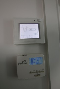 Upstairs hallway has a Mitsubishi controller for temperature, and a separate Ultra-Aire dehumidistat to control the indoor RH