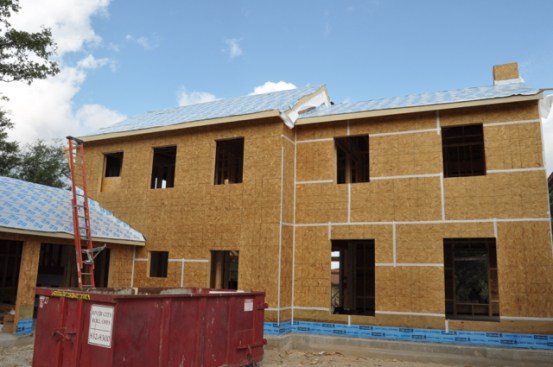 Siga Wigluv Tape applied to all the joints in the OSB. We also air sealed the slab to bottom plate connection with a 12″ strip of Carlisle CCW 705