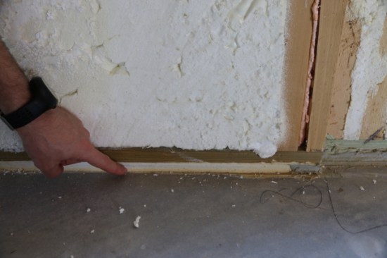 We also air sealed the inside bottom 2x plate to concrete slab connection with Tremco Dymonic caulk. I buy it in bulk sausage tubes and use a commercial sealant gun to save money.