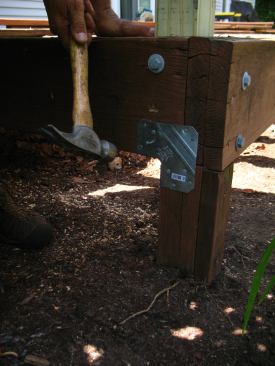 Retrofit metal hardware was used to reinforce the connections between the posts and rim beam.