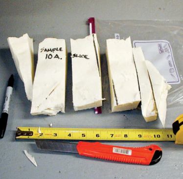 Smaller test pieces of the cured material can then be "thermally shocked" in a refrigerator or freezer to test for shrinkage. Note the straight-edged cuts between the smaller segments of foam.