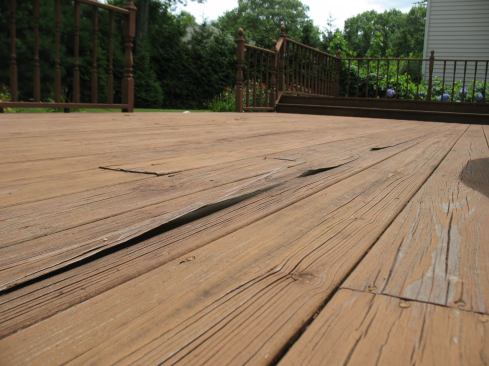 But a closer inspection of the deck revealed a number of problems, including PT deck boards that were checking and spitting—not exactly a foot-friendly walking surface.